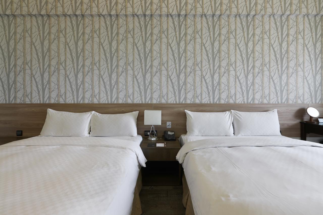 Kun Hotel Тайджун Екстериор снимка